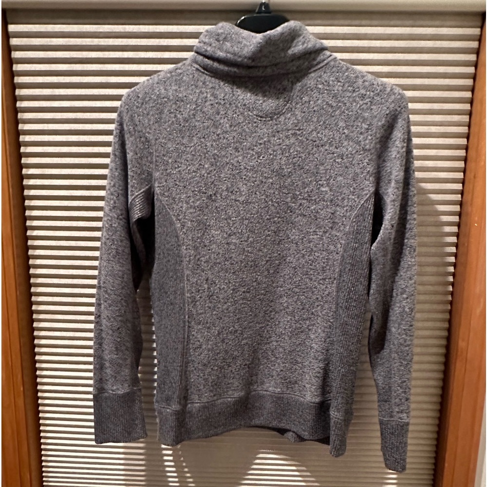 Woman’s turtle neck sweater